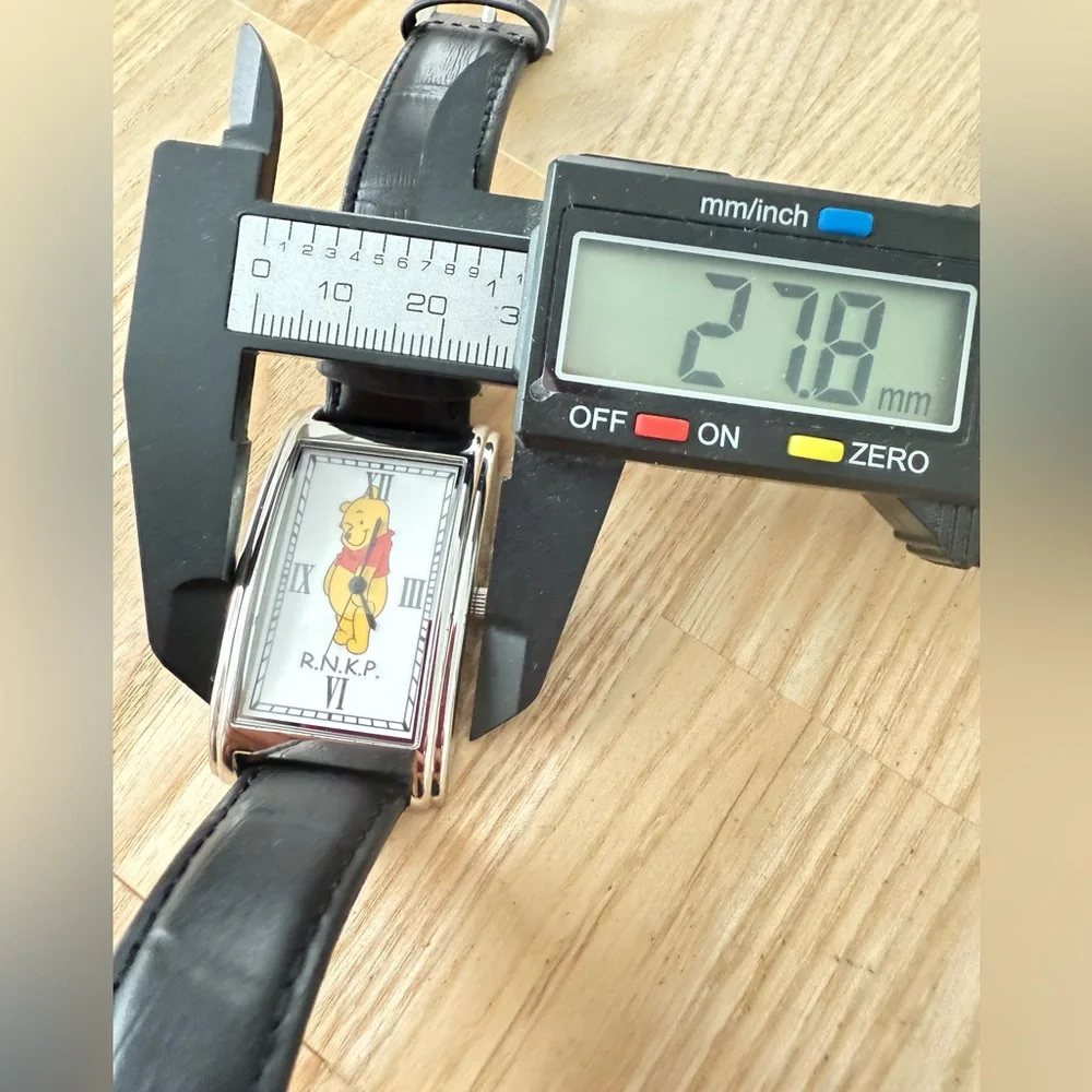Rare Vintage R.N.K.P. Disney Winnie the Pooh curvex watch NEW BATTERY